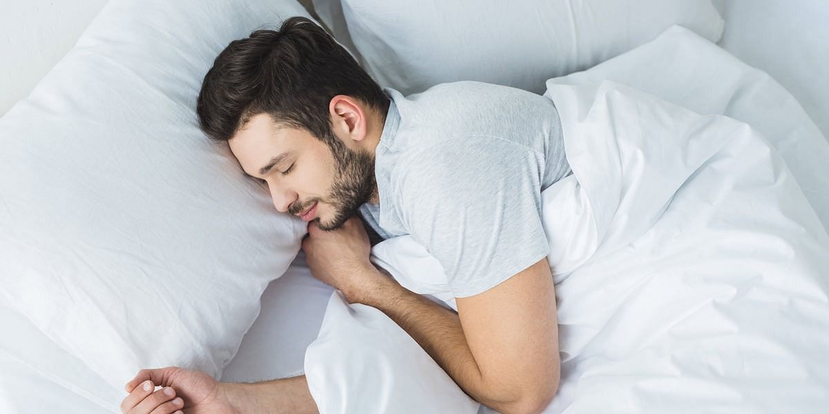 A person sleeping (Image via Getty Images)